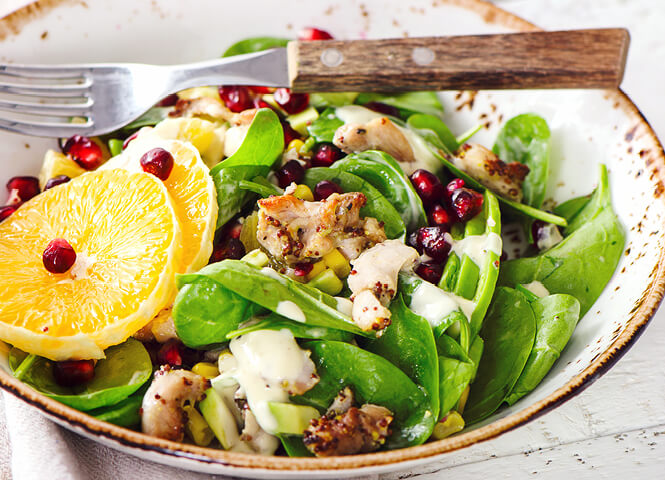Spinach, chicken and pomegranate salad